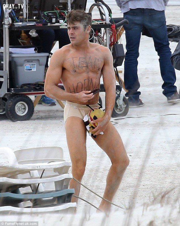 Showing off his chest ... and a whole lot more: Zac Efron stripped down to nude-coloured undies to film a scene on the beach on Tybee Island, Georgia, for his new comedy Dirty Grandpa on Tuesday