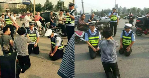 Cảnh sát Trung Quốc \"quỳ xuống\" để giải thích luật cho lái xe say rượu