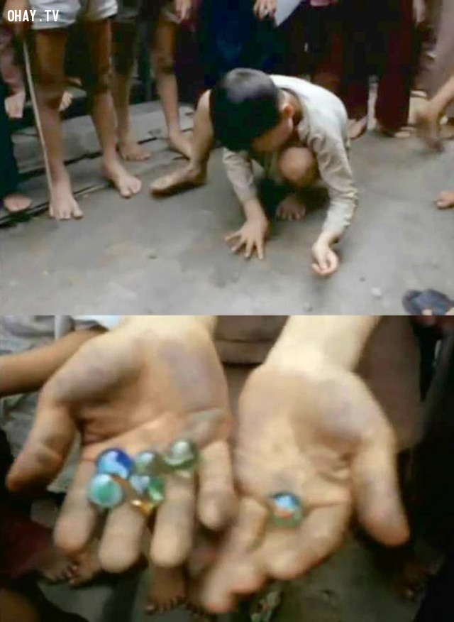Trẻ em chơi bắn "cu li" (bắn bi) ở cồn Tân Dinh (cồn Phụng) 1969 Trẻ em chơi bắn "cu li" (bắn bi) ở cồn Tân Dinh (cồn Phụng) 1969,Bến Tre xưa,Xứ dừa,hình xưa,ảnh cổ,ảnh lịch sử